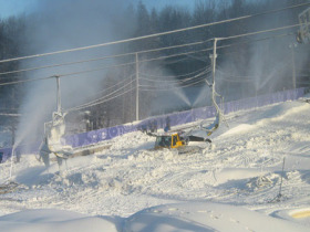 Groomer at work at Ski Bromont.