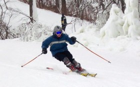 Skiers with chips in cards avoid lines.