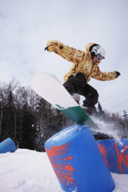 Snowboarder becomes airborne in one of Killington's terrain parks.