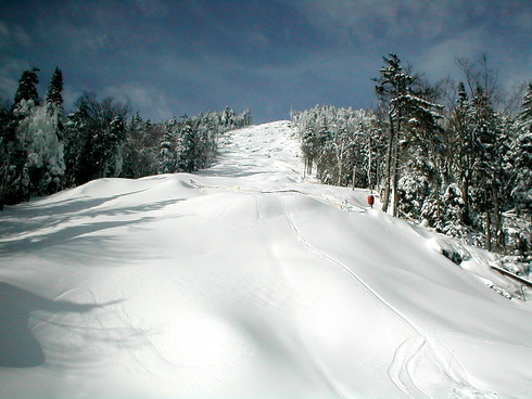 Snowmakers have buried the bottom of The Rumor- look for them moving up today, to the biggest baddest headwall in the East!